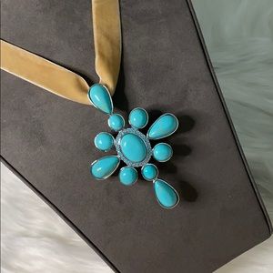 Turquoise and silver cross